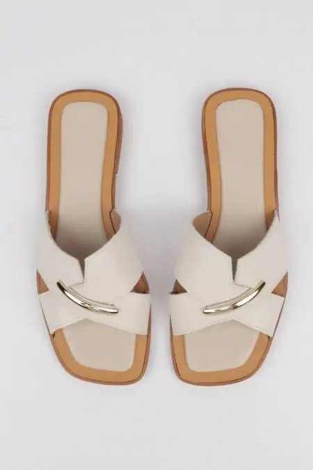 White leather flip-flops...