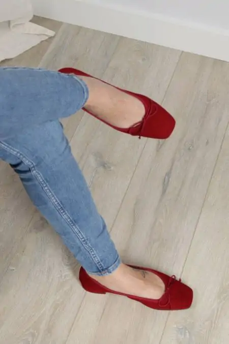 Red suede ballet flats...