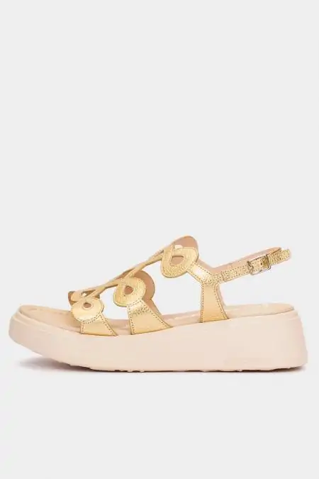 Sandalias doradas cuña...